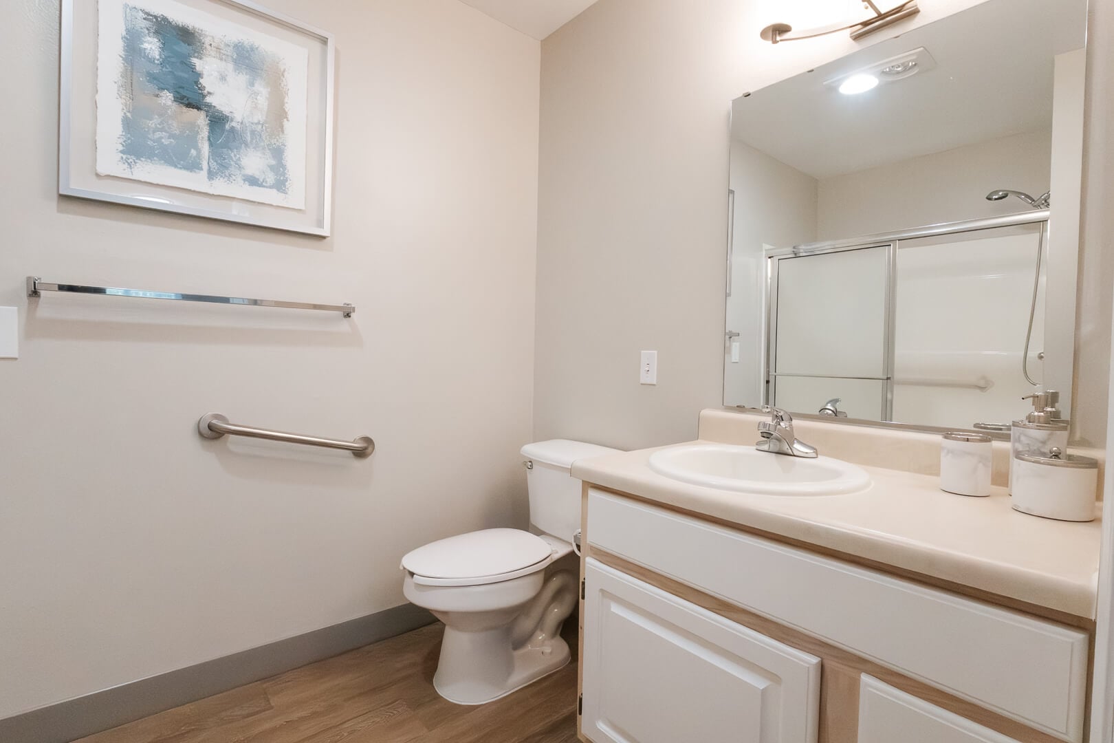 Clean Accessible Bathroom with Grab Bars and Vanity at an Independent Living Facility