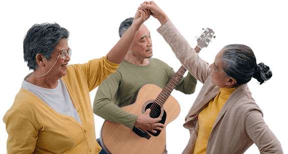 Elderly Friends Dancing and Playing Guitar Together during Music Time at an Independent Living Facility Elderly Friends Dancing and Playing Guitar Together during Music Time at an Independent Living Facility